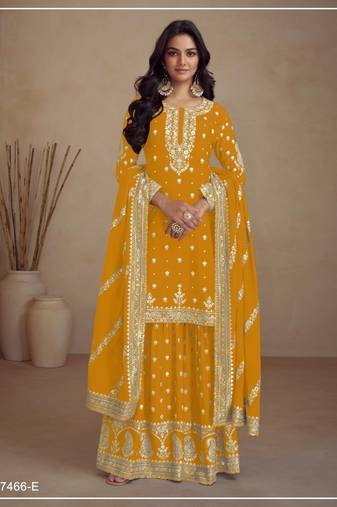 Yellow silk semi stitched wedding palazzo suits