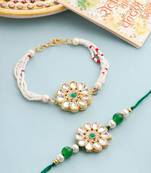 set of 2 kundan studded floral design gold toned bhaiya bhabhi rakhi set with roli chawal chandan & mishri