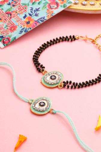 set of 2 green round shape artificial stones bhaiya bhabhi rakhi with roli chawal chandan & mishri