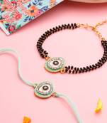 set of 2 green round shape artificial stones bhaiya bhabhi rakhi with roli chawal chandan & mishri