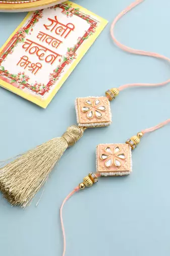 set of 2 handmade peach kundan studded bhaiya bhabhi rakhi set with roli chawal chandan & mishri