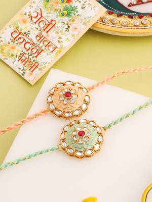 men set of 2 peach & green kundan studded round floral design rakhi with roli chawal chandan & mishri 1