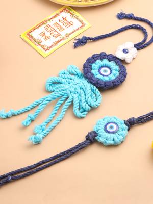 set of 2 blue evil eye floral bhaiya bhabhi rakhi with roli chawal chandan & mishri 1