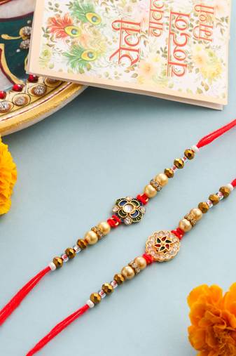   set of 2 red & gold floral design artificial stones & beads thread rakhi with roli chawal chandan & mishri