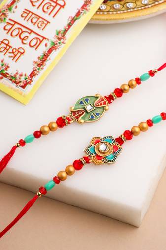   set of 2 floral design red artificial stones & beads thread rakhi with roli chawal chandan & mishri