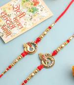   set of 2 golden red religious designer ganesh ji thread rakhi with roli chawal chandan & mishri