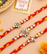   set of 3 red & yellow kundan studded floral design thread rakhi with roli chawal chandan & mishri