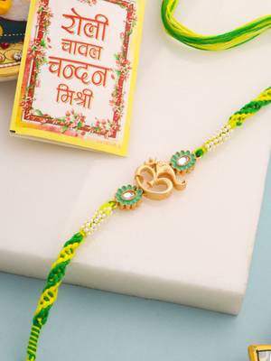 men green kundan studded om design thread rakhi with roli chawal chandan & mishri 1