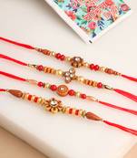   set of 4 red artificial stones & beads floral shape thread rakhi with roli chawal chandan & mishri