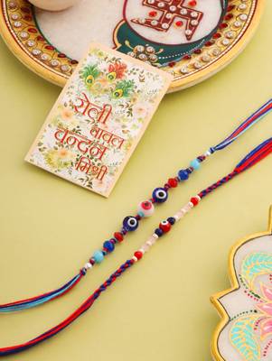   multicolor evil eye artificial beads thread rakhi with roli chawal chandan & mishri 1