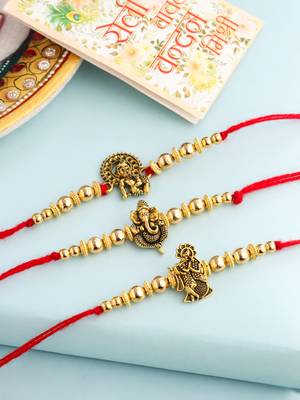   set of 3 gold toned designer ganesh ji thread rakhi with roli chawal chandan & mishri 1