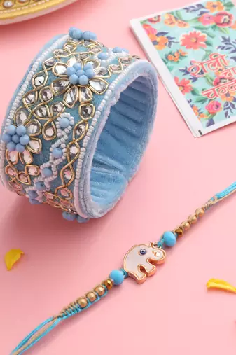  set of 2 blue artificial stones & beads floral bhaiya bhabhi rakhi with roli chawal chandan & mishri