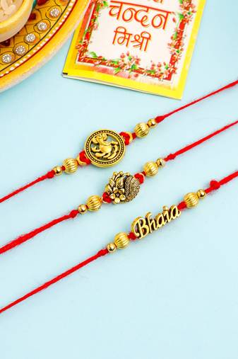   set of 3 gold toned thread rakhi with roli chawal chandan & mishri