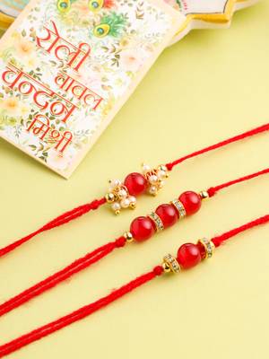   set of 3 red artificial beads & pearls thread rakhi with roli chawal chandan & mishri 1