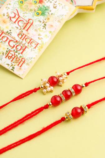   set of 3 red artificial beads & pearls thread rakhi with roli chawal chandan & mishri