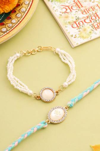  set of 2 white pearls & artificial beads bhaiya bhabhi rakhi with roli chawal chandan & mishri