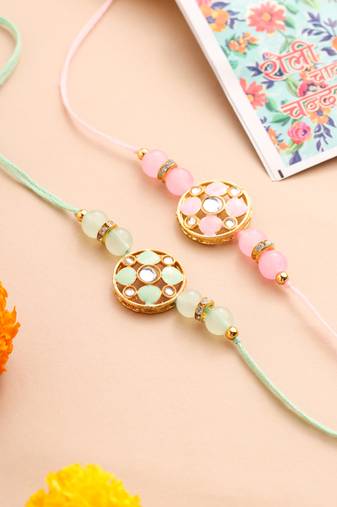   set of 2 artificial stones & beads floral design thread rakhi with roli chawal chandan & mishri