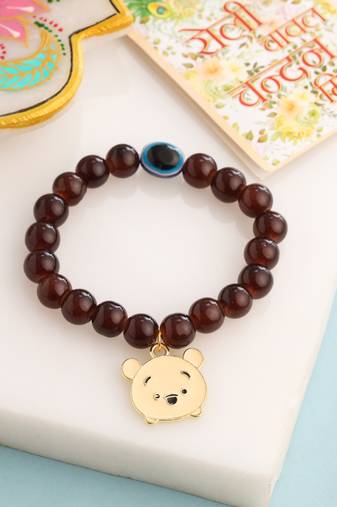 kids cartoon design brown artificial beads thread rakhi with roli chawal chandan & mishri