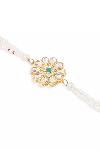 set of 2 kundan studded floral design gold toned bhaiya bhabhi rakhi set with roli chawal chandan & mishri