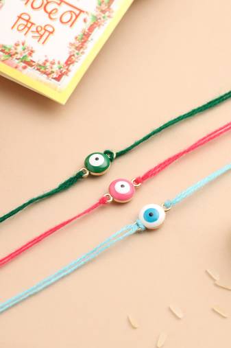 set of 3 multicolor evil eye thread rakhi with roli chawal chandan & mishri