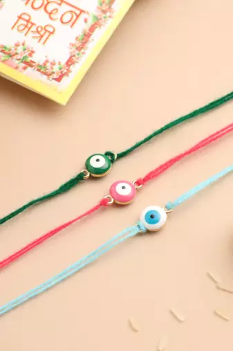 set of 3 multicolor evil eye thread rakhi with roli chawal chandan & mishri