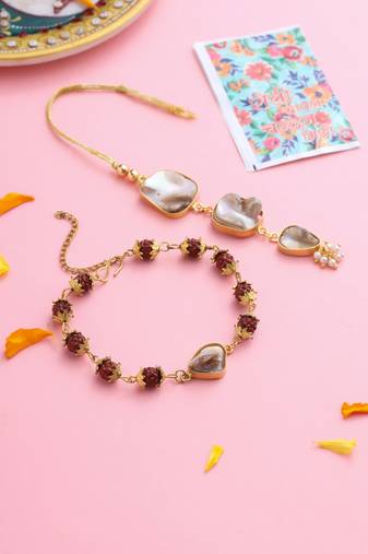  set of 2 gold toned rudraksh & pearls bhaiya bhabhi rakhi with roli chawal chandan & mishri