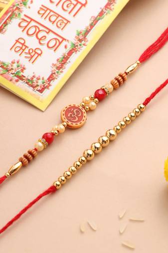 set of 2 red religious thread rakhi with roli chawal chandan & mishri