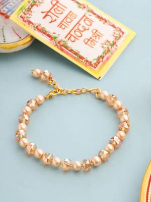 women gold toned artificial beads wraparound rakhi with roli chawal chandan & mishri 1