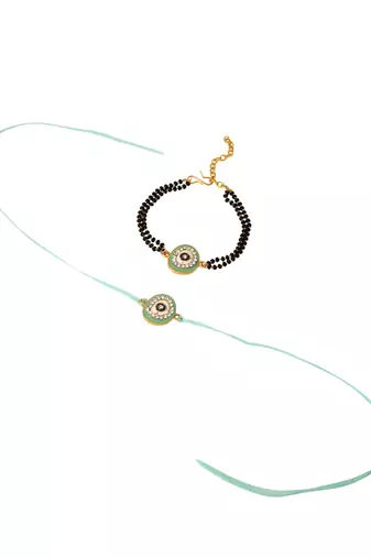 set of 2 green round shape artificial stones bhaiya bhabhi rakhi with roli chawal chandan & mishri