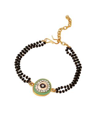 set of 2 green round shape artificial stones bhaiya bhabhi rakhi with roli chawal chandan & mishri 4