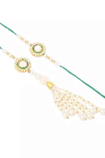 set of 2 white & green stone studded handcrafted bhaiya bhabhi thread rakhi with roli chawal chandan & mishri