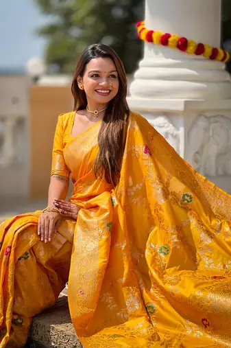 Yellow soft banarasi silk blend meenakari weaving saree with unstitched blouse