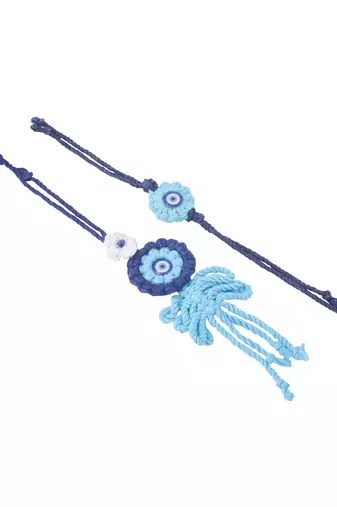 set of 2 blue evil eye floral bhaiya bhabhi rakhi with roli chawal chandan & mishri