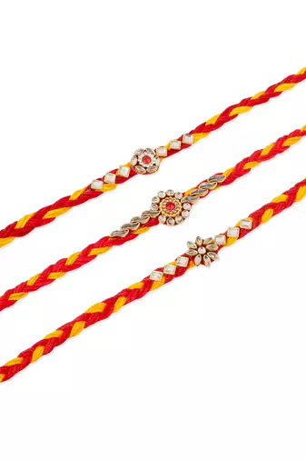   set of 3 red & yellow kundan studded floral design thread rakhi with roli chawal chandan & mishri