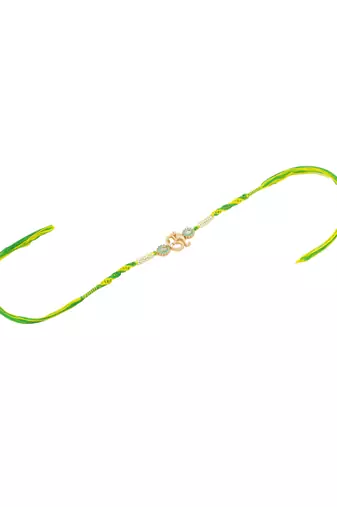 men green kundan studded om design thread rakhi with roli chawal chandan & mishri