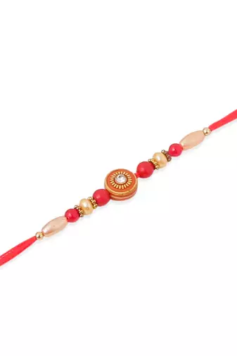   set of 4 red artificial stones & beads floral shape thread rakhi with roli chawal chandan & mishri