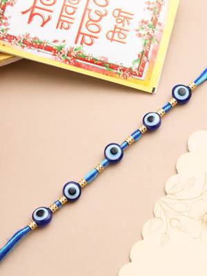 blue evil eye thread rakhi with roli chawal chandan & mishri 5