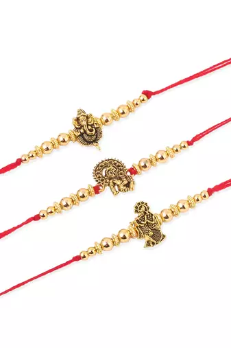   set of 3 gold toned designer ganesh ji thread rakhi with roli chawal chandan & mishri
