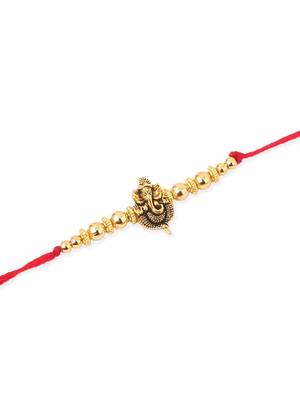   set of 3 gold toned designer ganesh ji thread rakhi with roli chawal chandan & mishri 4