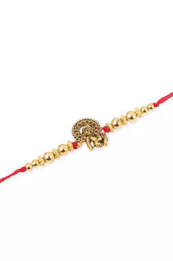   set of 3 gold toned designer ganesh ji thread rakhi with roli chawal chandan & mishri