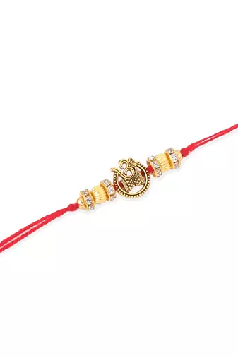   set of 4 gold toned artificial stones swastik design thread rakhi with roli chawal chandan & mishri