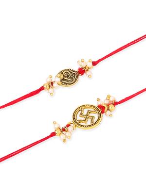   set of 2 gold toned pearls swastik desgin thread rakhi with roli chawal chandan & mishri 2