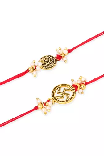   set of 2 gold toned pearls swastik desgin thread rakhi with roli chawal chandan & mishri