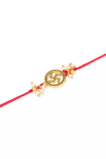   set of 2 gold toned pearls swastik desgin thread rakhi with roli chawal chandan & mishri