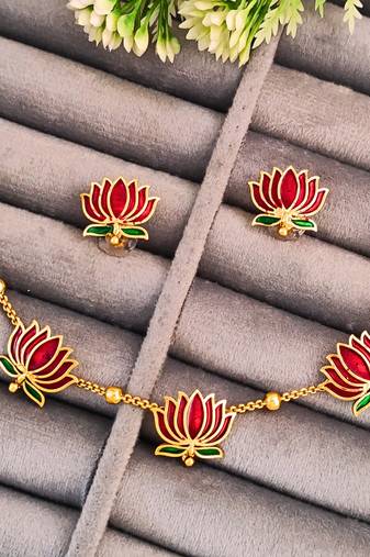 Traditional gold-plated lotus necklace and earrings set with red enamel work, indian jewellery