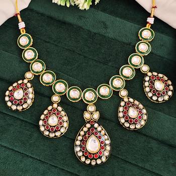 Traditional indian kundan necklace set with earrings, green enamel and ruby red stones, gold-plated 3