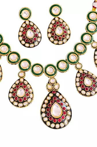 Traditional indian kundan necklace set with earrings, green enamel and ruby red stones, gold-plated