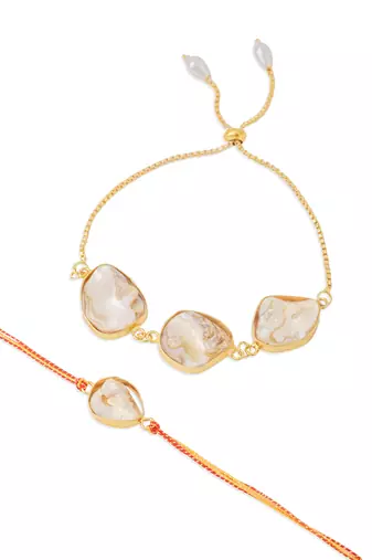  set of 2 gold toned pearls bhaiya bhabhi rakhi with roli chawal chandan & mishri