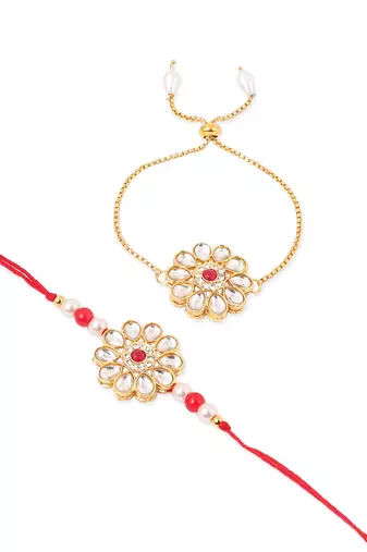 set of 2 gold toned kundan studded floral design bhaiya bhabhi rakhi set with roli chawal chandan & mishri