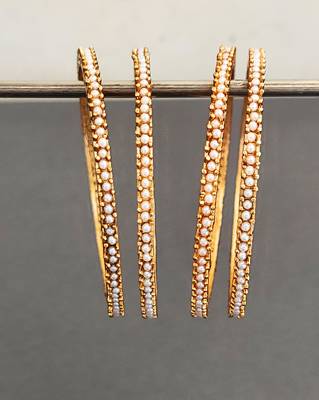 gold alloy bangles set with pearl work 3